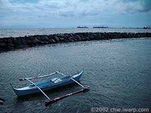 lonely boat by the bay